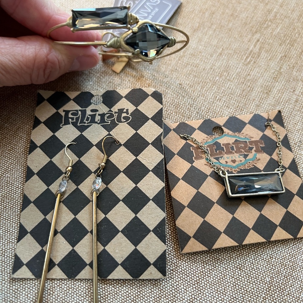 Necklace, Earrings and 2 Bracelets